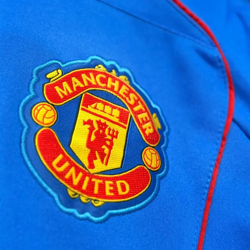 MAN UTD BLUE 2025/26 OFFICIAL MERCHANDISE PREMIUM JACKET