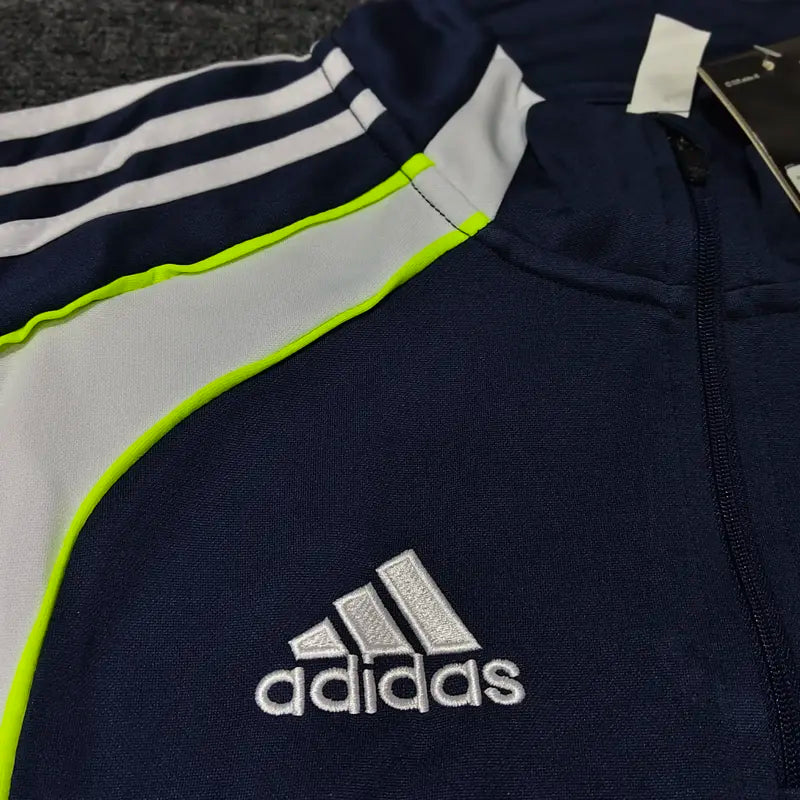 REAL MADRID NAVY BLUE AND NEON 4 STIRIPES 2025/26 OFFICIAL TRACKSUIT